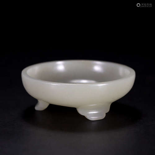 A THREE-LEGGED WHITE JADE CUP