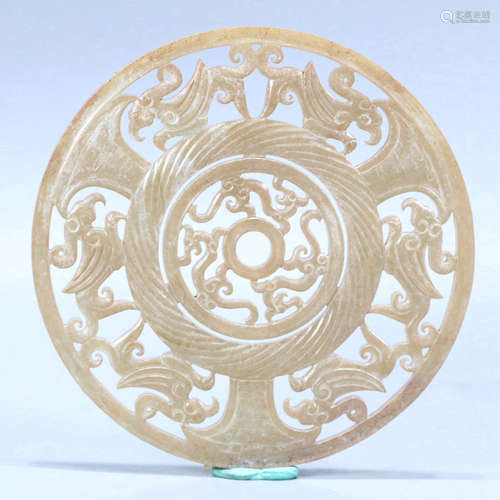 A DRAGON PHOENIX MOTIF WHITE JADE BI