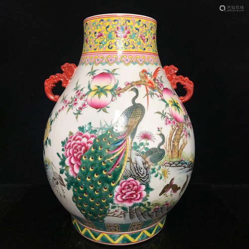 AN ENAMEL PEONY PHOENIX MOTIF TWIN EAR PORCELAIN ZUN VASE