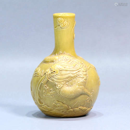 A YELLOW GLAZE DRAGON MOTIF PORCELAIN BOTTLE VASE