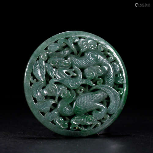 A DRAGON CARVED JADEITE DISK