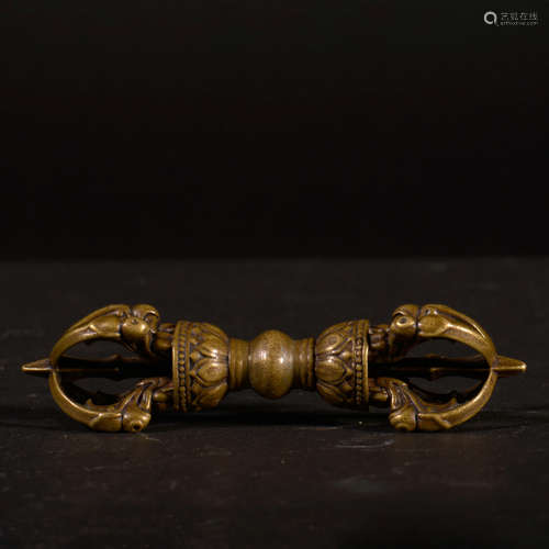 A GILT BRONZE VAJRA