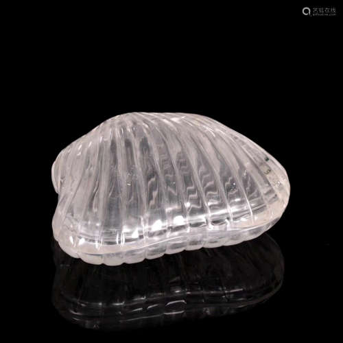 A SHELL-SHAPED CRYSTAL CASE WITH COVER