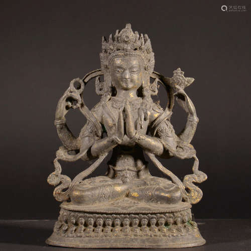 A GILD BRONZE STATUE OF THE FOUR ARMS MANJUSRI BODHISATTVA