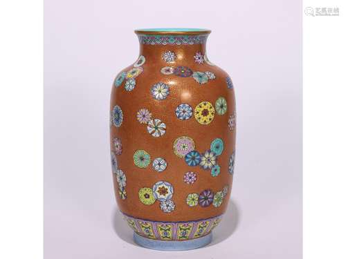 A CORAL-GROUND FAMILLE ROSE VASE, QIANLONG MARK