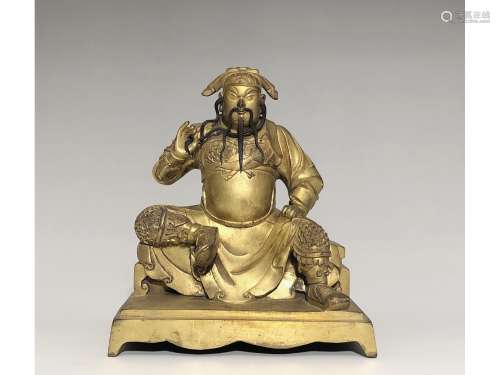 A GILT-BRONZE FIGURE OF GUAN GONG