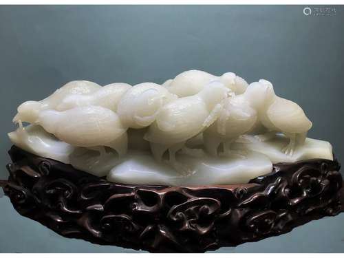 A WHITE JADE ORNAMENT OF QUAILS