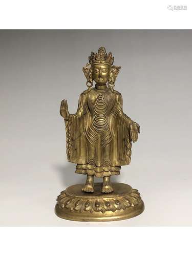 A GILT-BRONZE FIGURE OF SHAKYAMUNI