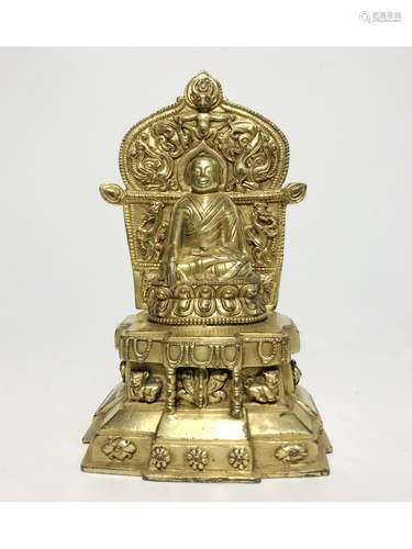 A GILT-BRONZE FIGURE OF GURU