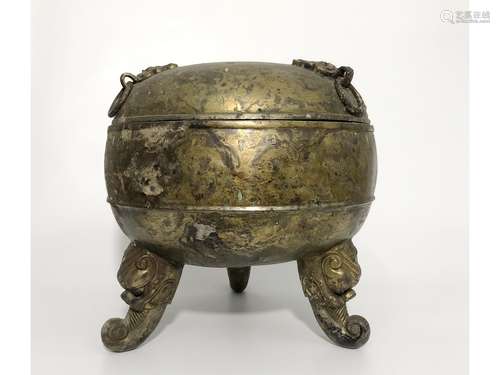 A GILT-BRONZE TRIPOD VESSEL AND COVER