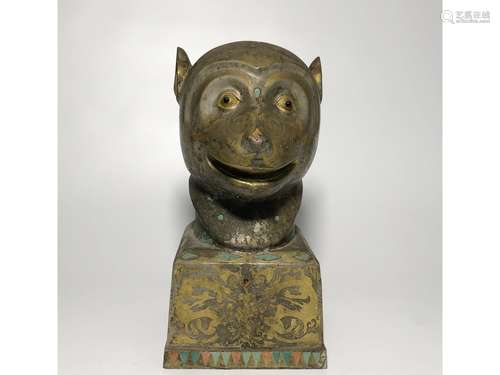 A GILT-BRONZE MONKEY HEAD