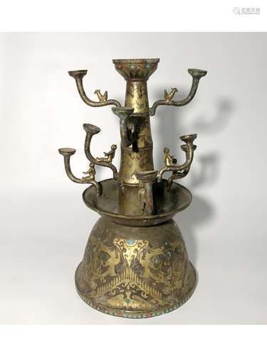 A GILT-BRONZE CANDLE HOLDER