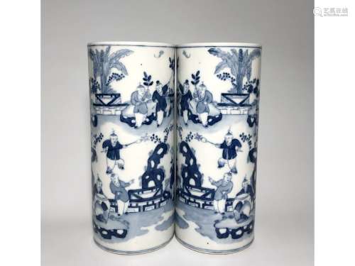 A PAIR OF BLUE AND WHITE HAT HOLDERS
