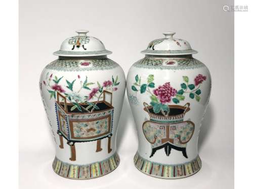 A PAIR OF FAMILLE ROSE INSCRIBED JARS AND COVER