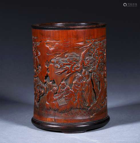 A QING DYNASTY CARVED BAMBOO CHARACTER SHAPE BRUSH POT