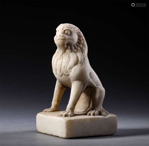 A TANG DYNASTY WHITE MARBLE LOIN SHAPE ORNAMENT