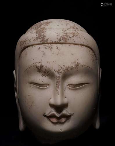 A NORTHERN QI DYNASTY WHITE MARBLE BUDDHA HEAD