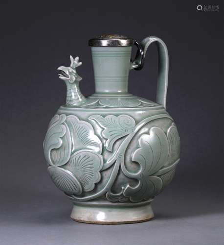 A LIAO DYNASTY CELADON PHOENIX-HEADED HANDLED POT