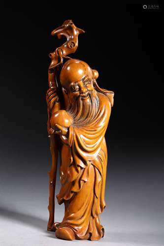 A QING DYNASTY CARVED BOXWOOD GOD OF LONGEVITY SHAPE ORNAMENT