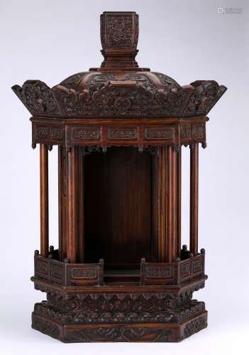 A QING DYNASTY CARVED ROSEWOOD BUDDHIST ALTAR