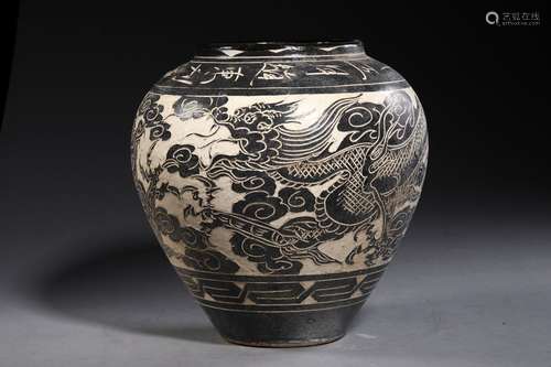 A SONG DYNASTY CIZHOU KILN DRAGON PATTERN POT