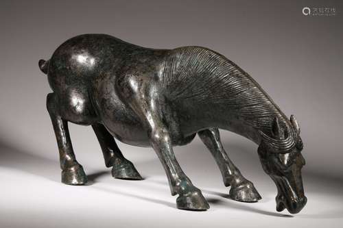 A WARRING STATES PERIOD BRONZE HORSE SHAPE ORNAMENT