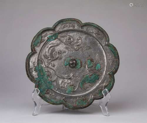 A TANG DYNASTY PHOENIX PATTERN BRONZE MIRROR