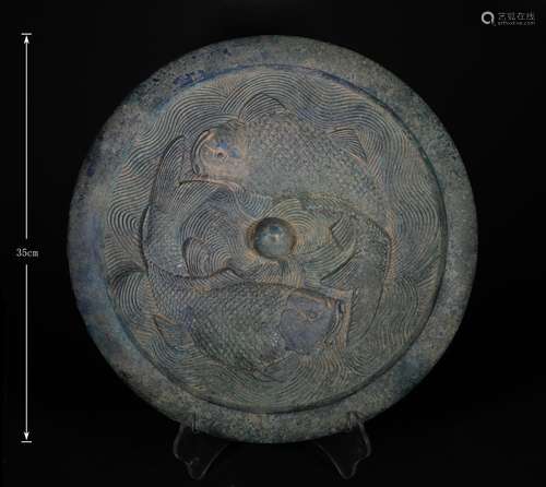 A LIAO DYNASTY DUO FISH PATTERN BRONZE MIRROR