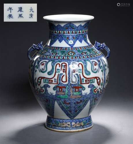 A QING DYNASTY DOU CAI TAOTIE DESIGN ZUN BOTTLE