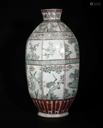 A MING DYNASTY LONGQING SU CAI BIRDS AND FLOWER EIGHT ARRISES BOTTLE