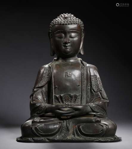 A MING DYNASTY SAKYAMUNI STATUE