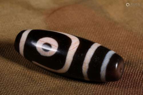 A HAN DYNASTY DZI BEAD