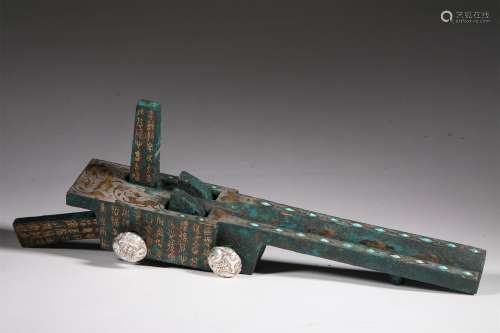 A WARRING STATES PERIOD GOLD AND SILVER INLAID CROSSBOW