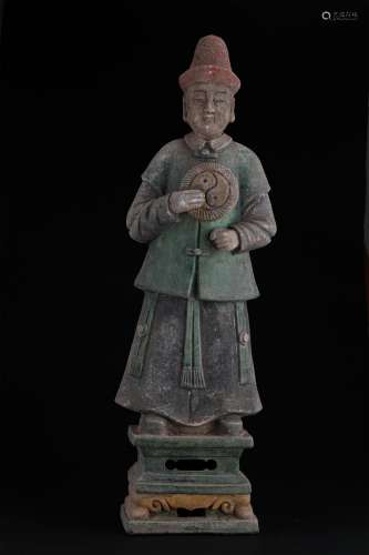 A MING DYNASTY COLORED CERAMIC CHARACTER ORNAMENT