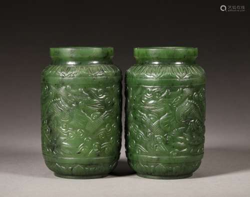 A PAIR OF QING DYNASTY CARVED GREEN JADE DRAGON PATTERN BOTTLES