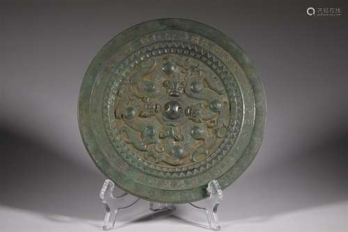 A WARRING STATES PERIOD DRAGON PATRTERN BRONZE MIRROR