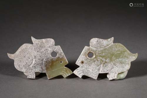 A PAIR OF WEST ZHOU DYNASTY CARVED JADE RABBIT SHAPE ORNAMENTS