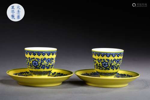 A PAIR OF QING DYNASTY BLUE AND WHITE WITH YELLOW GLAZED CUPS