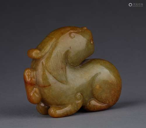 A MING DYNASTY CARVED JADE ORNAMENT