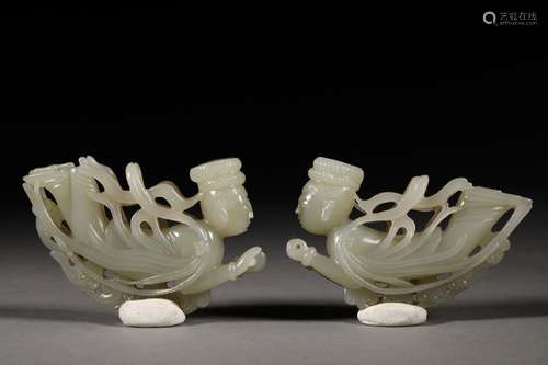 A PAIR OF LIAO DYNASTY CARVED WHITE JADE ORNAMENTS