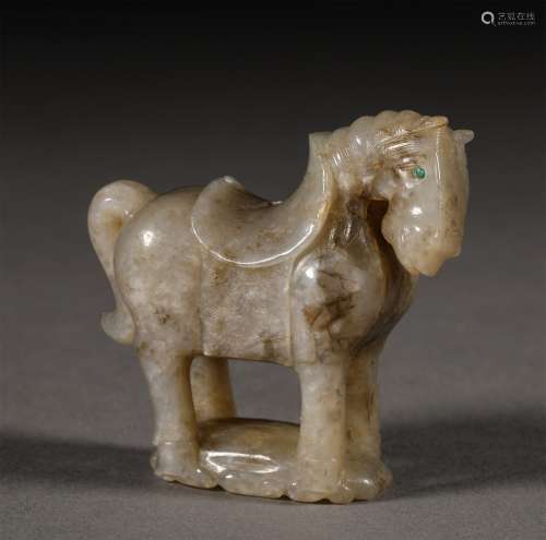 A TANG DYNASTY CARVED JADE HORSE ORNAMENT