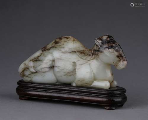 A MING DYNASTY CARVED HETIAN JADE CAMEL SHAPE ORNAMENT
