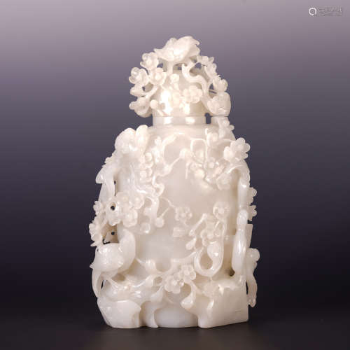 A CHINESE CARVED MAGPIES IN PLUM BLOSSOM WHITE JADE BOTTLE