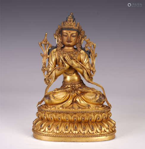 A CHINESE GILT BRONZE BODHISATTVA MANJUSRI SEATED STATUE