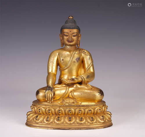 A CHINESE GILT BRONZE SAKYAMUNI BUDDHA SEATED STATUE