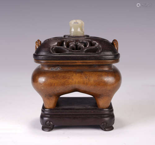 A CHINESE FOUR FEET DOUBLE HANDLE BRONZE INCENSE BURNER
