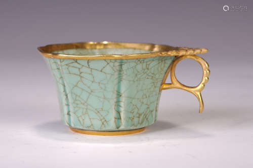 A CHINESE OLD KILN CUP WITH HANDLE