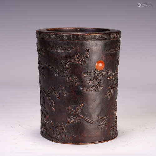 A CHINESE ZITAN BRUSH POT CARVING MAGPIES IN PLUM BLOSSOM