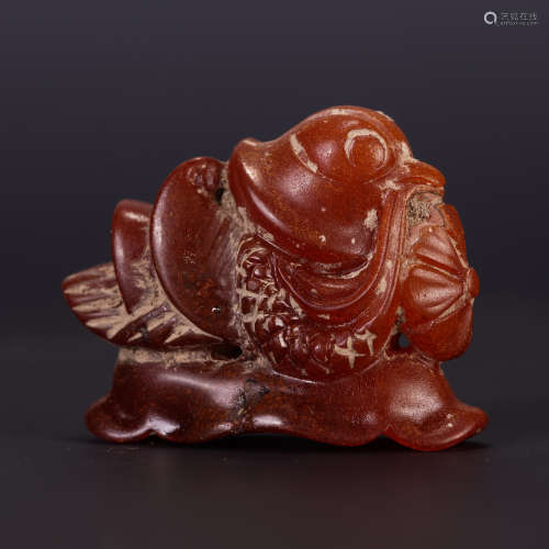 A CHINESE AMBER TABLE ITEM