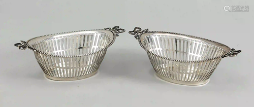 Pair of oval breakthrough baskets,